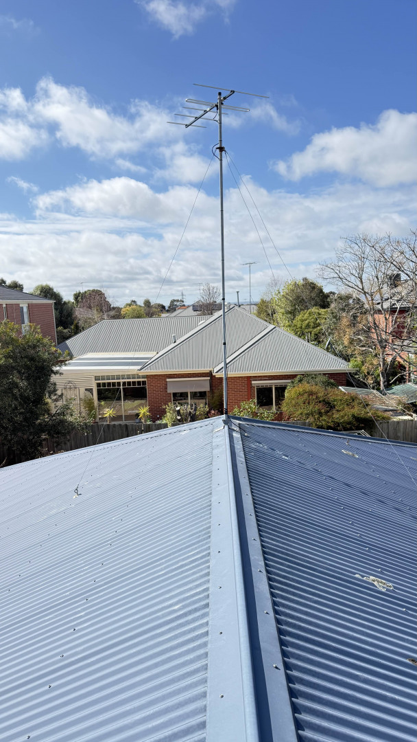 New antenna installed on a roof in Highton, Victoria, by technician John.