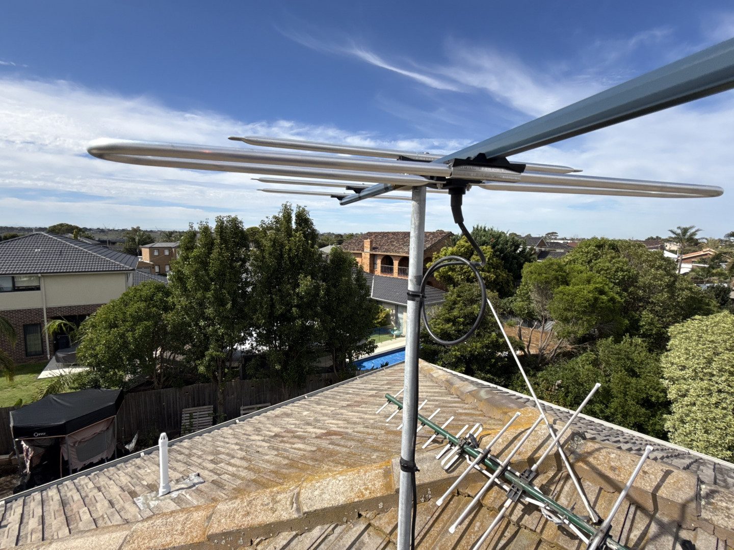 New HD TV antenna installed on a tiled roof in Keilor