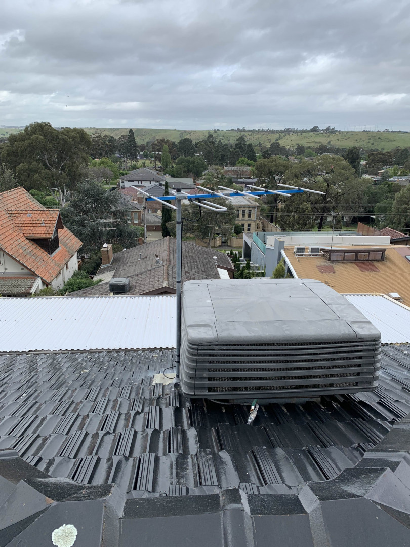 Antenna moved to a new mount on a three-level home in Keilor