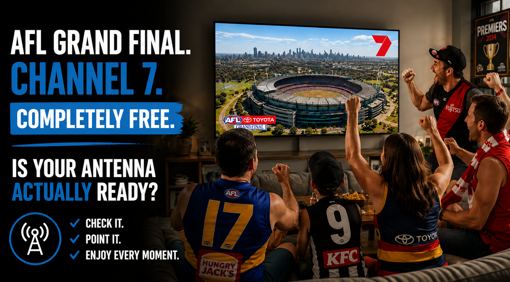 Group of AFL supporters cheering while watching a live football game on a wall-mounted television in an Australian home.