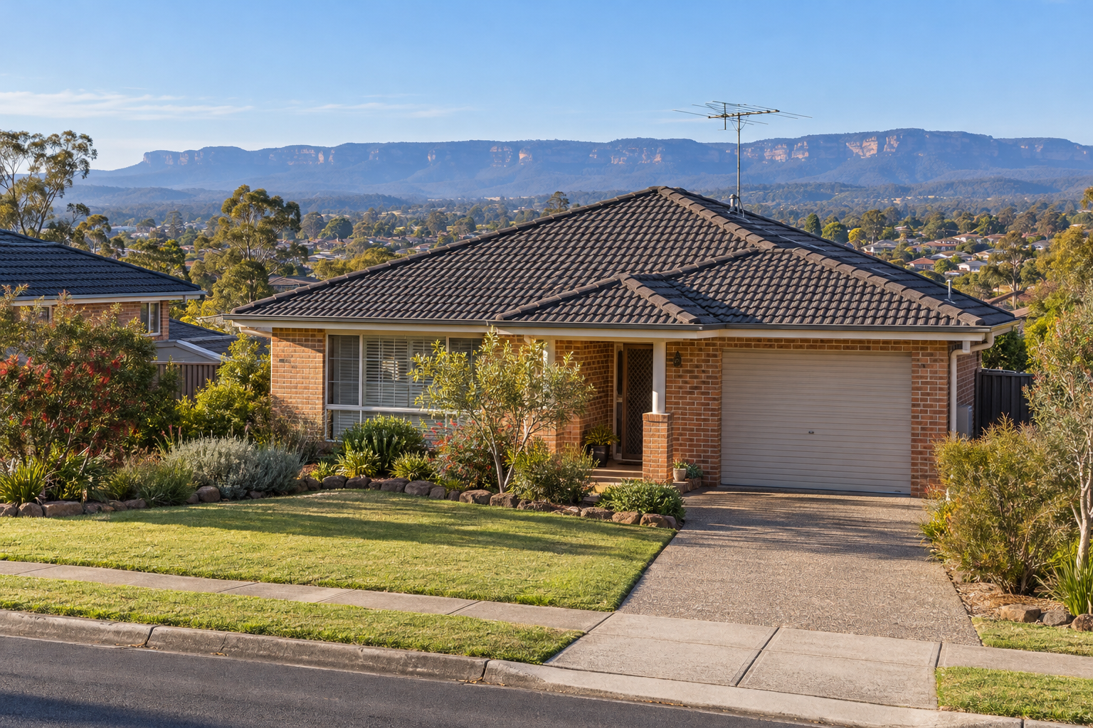 TV antenna on a home in Penrith with the Blue Mountains in the background